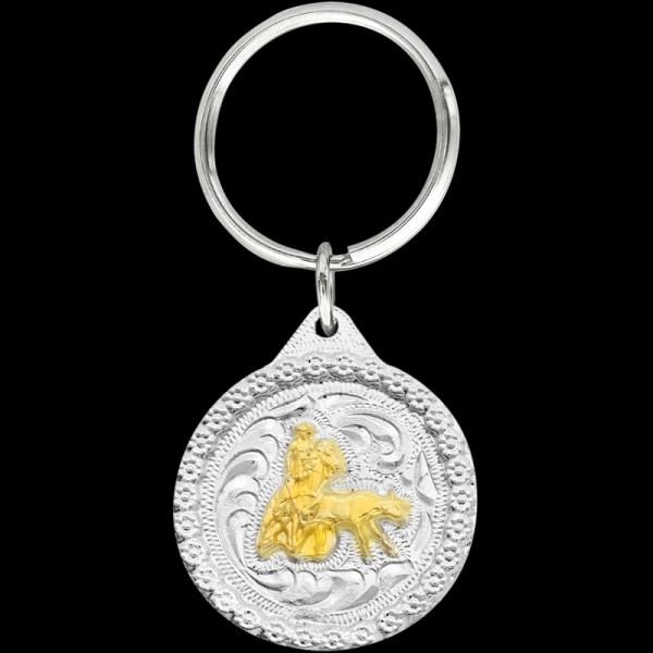 Add a touch of Western charm to your keys with our Gold Heeler Keychain. This keychain celebrates the spirit of ranching and rodeo with a shiny golden figure. Shop now!